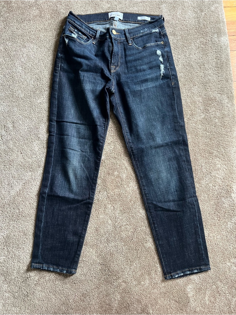 Frame Denim Women's Dark Wash Skinny Jeans with Light Distressing